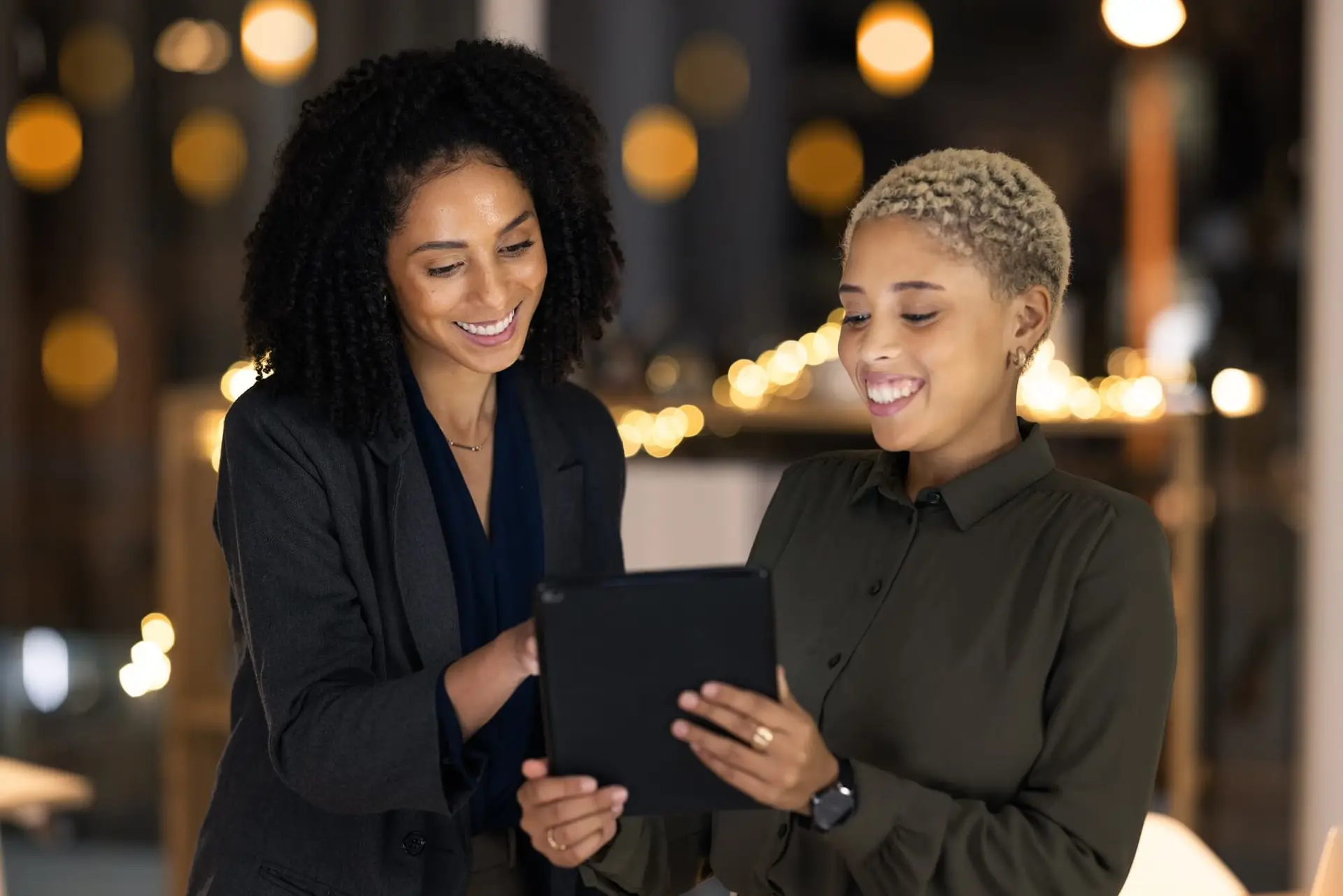 tablet-black-woman-and-social-media-manager-at-a-digital-marketing-agency-coworking-on-a-branding.jpg