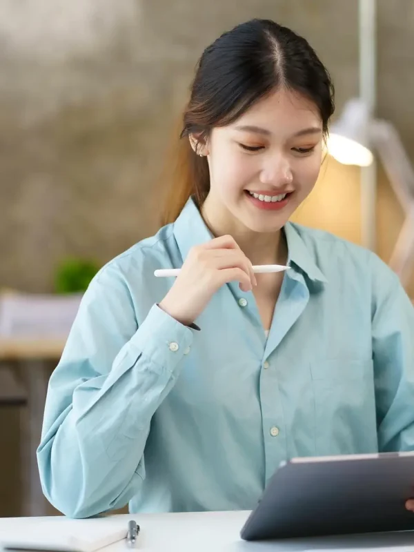 portrait-of-young-asian-business-woman-using-digital-tablet-in-the-office-.jpg